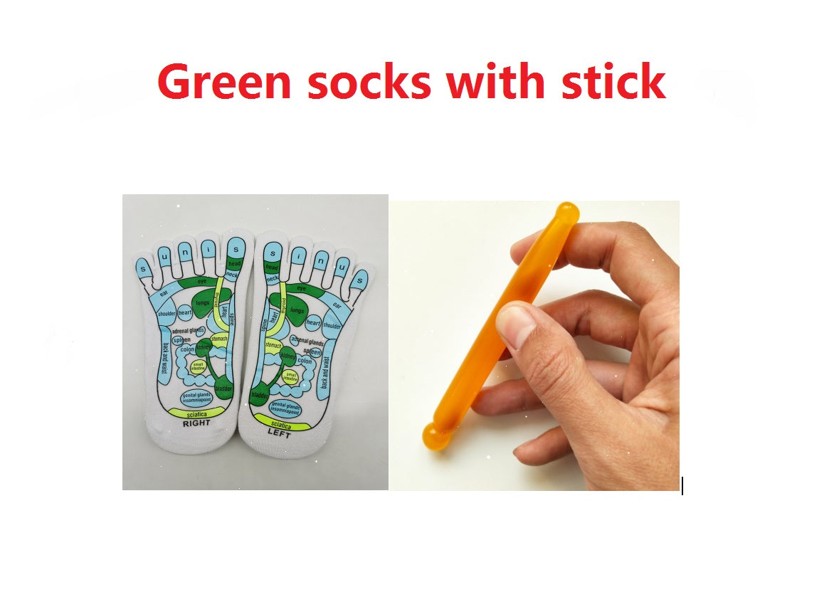 Reflexology socks with foot massage stick for acupressure therapy.