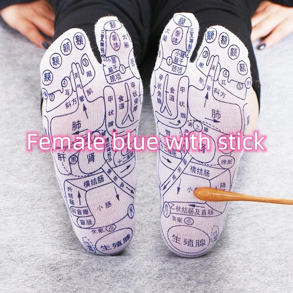 Reflexology socks with acupressure diagrams and massage stick for foot therapy.